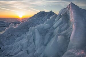 Sunrise over the ice piles